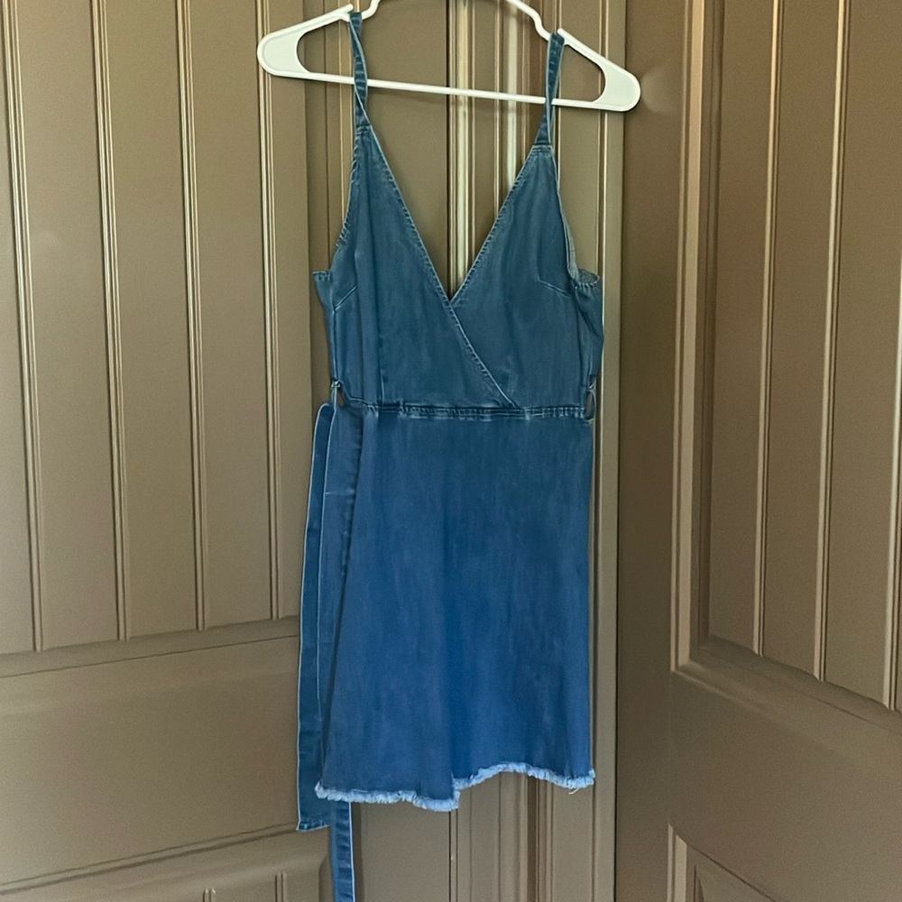 Super cute jeans dress! Removable belt low cut V neck. Super comfy + great color